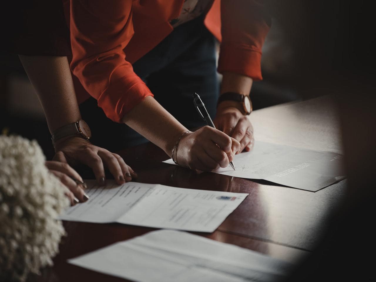 Man signing documents